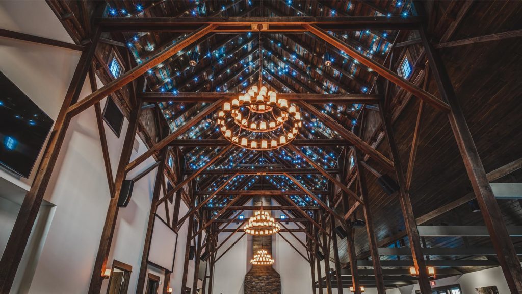 view of wooden aframe barn ceiling at Palace Event Center